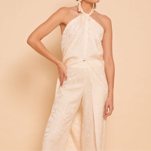 Journey Like No Other Jacquard
Draped Halter Top and Pants Set By Johanna Ortiz - Picture 12 of 12